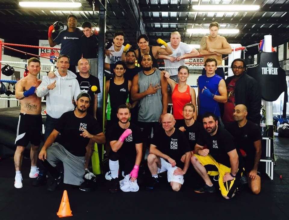 A group photo of boxing students facing forward